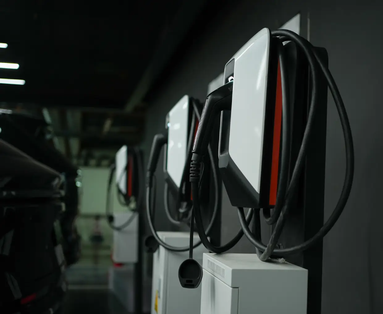 Electric vehicle charging stations in a row.